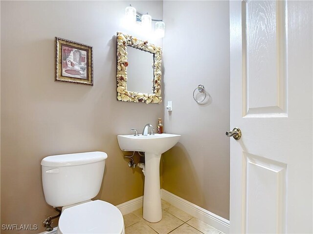 14031 W Hyde Park Dr Unit 201, Fort Myers, FL 33912 - bathroom with toilet and tile patterned flooring