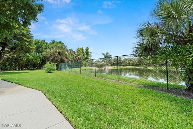 8851 Colonnades Ct W Unit 128, Bonita Springs, FL 34135 - view of yard featuring a water view