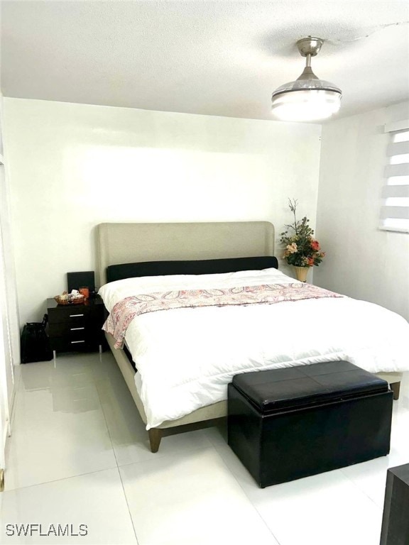 1395 NE 167th St # 107, North Miami Beach, FL 33162 - bedroom with light tile patterned floors