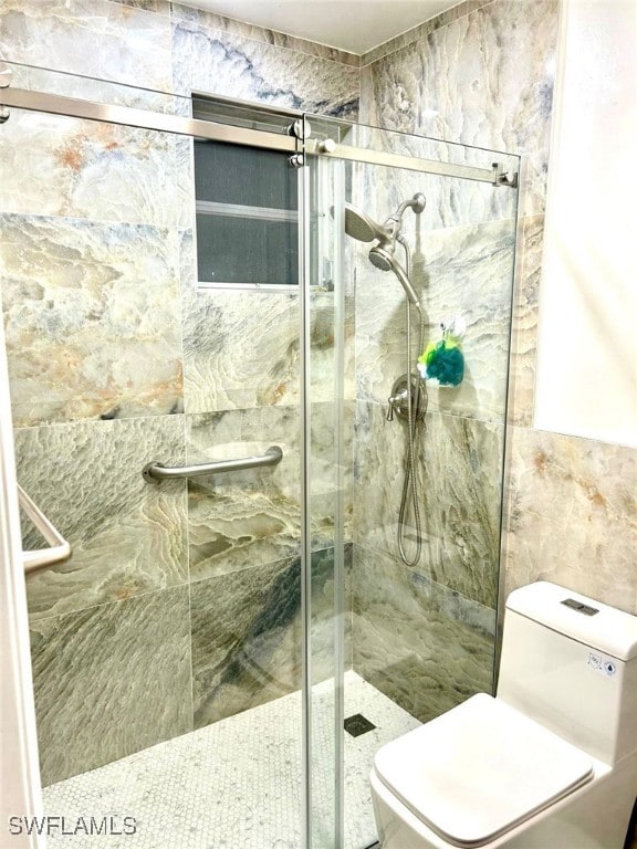 1395 NE 167th St # 107, North Miami Beach, FL 33162 - bathroom featuring a shower stall and toilet