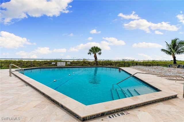 180 Seaview Ct Unit 314, Marco Island, FL 34145 - community pool with a patio area
