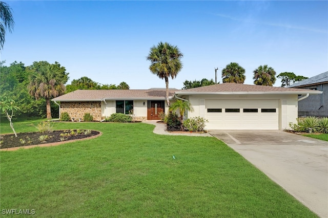 3307 Pinetree St, Port Charlotte, FL 33952 - single story home with concrete driveway, an attached garage, a front lawn, and stucco siding