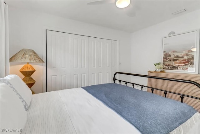 701 Harbour Dr, Naples, FL 34103 - bedroom with a closet and ceiling fan