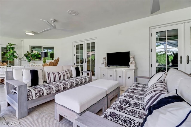 701 Harbour Dr, Naples, FL 34103 - living area with french doors and ceiling fan