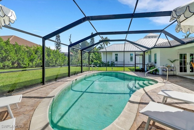 701 Harbour Dr, Naples, FL 34103 - swimming pool featuring a yard, a patio area, french doors, and glass enclosure