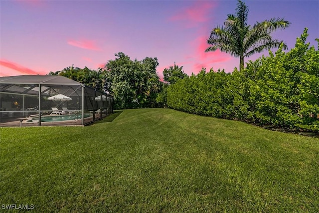 701 Harbour Dr, Naples, FL 34103 - view of green lawn featuring an outdoor pool and a lanai