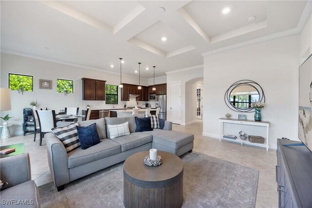 6787 Winding Cypress Dr, Naples, FL 34114 - living area featuring arched walkways, coffered ceiling, ornamental molding, light tile patterned flooring, and beamed ceiling