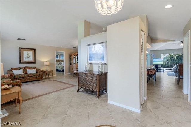 941 Ironwood Ct, Marco Island, FL 34145 - corridor with light tile patterned floors, a chandelier, and recessed lighting