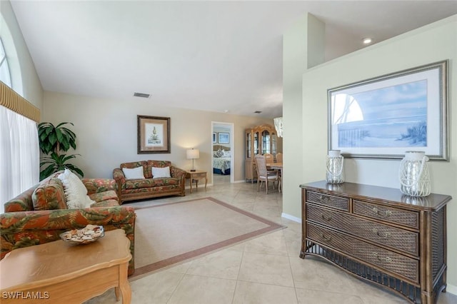 941 Ironwood Ct, Marco Island, FL 34145 - living area featuring light tile patterned floors and baseboards