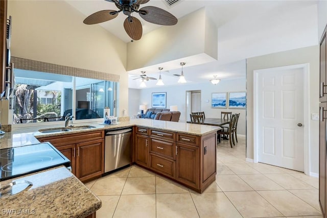 941 Ironwood Ct, Marco Island, FL 34145 - kitchen with dishwasher, ceiling fan, light stone countertops, light tile patterned floors, and open floor plan