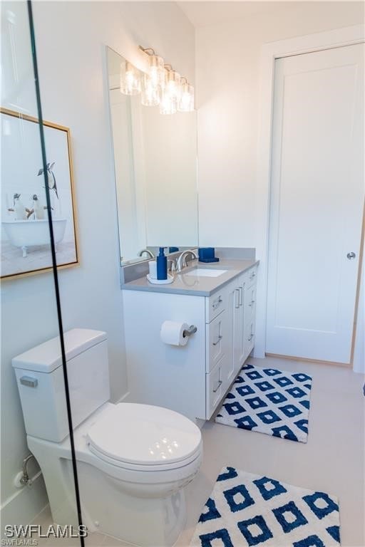 756 108th Ave N, Naples, FL 34108 - bathroom featuring toilet and vanity