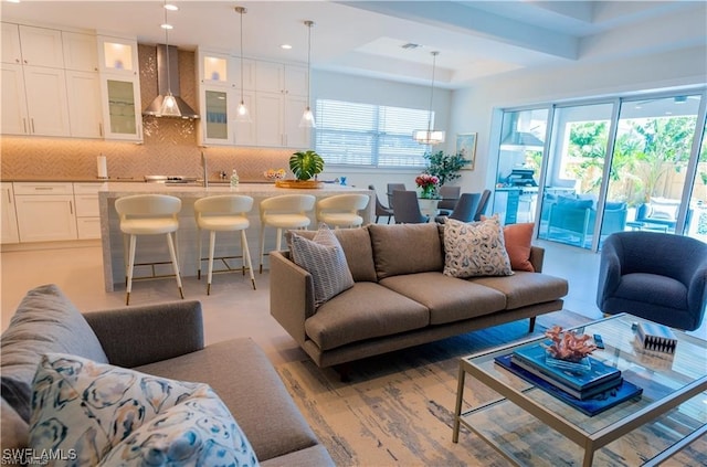 756 108th Ave N, Naples, FL 34108 - living area featuring a chandelier