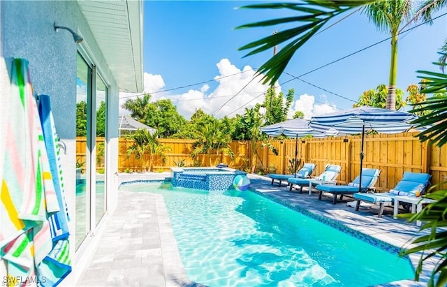 756 108th Ave N, Naples, FL 34108 - view of pool featuring a fenced backyard, a patio area, and a pool with connected hot tub