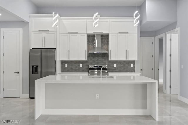 2218 SW 25th St, Cape Coral, FL 33914 - kitchen with wall chimney range hood, stainless steel appliances, white cabinetry, an island with sink, and light countertops
