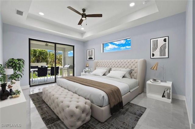 2218 SW 25th St, Cape Coral, FL 33914 - bedroom with a tray ceiling, access to exterior, recessed lighting, and a ceiling fan
