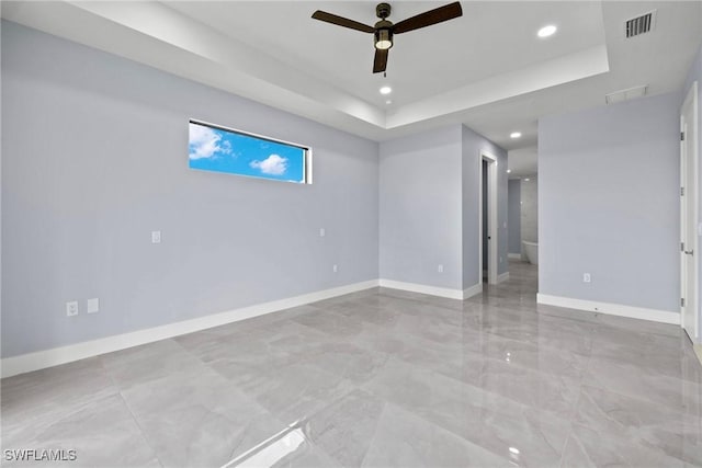2218 SW 25th St, Cape Coral, FL 33914 - unfurnished room featuring recessed lighting, a ceiling fan, and a tray ceiling