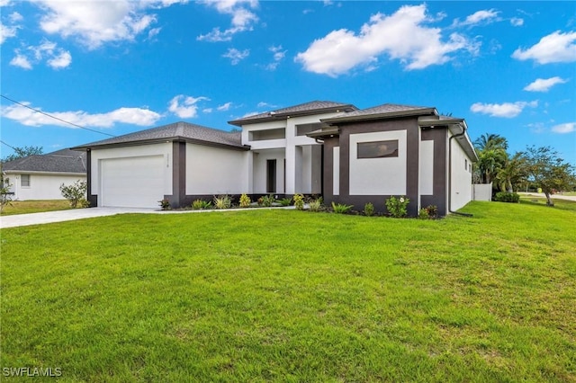 2218 SW 25th St, Cape Coral, FL 33914 - prairie-style house featuring driveway, stucco siding, a garage, and a front yard