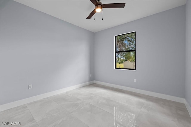 2218 SW 25th St, Cape Coral, FL 33914 - empty room with a ceiling fan and baseboards