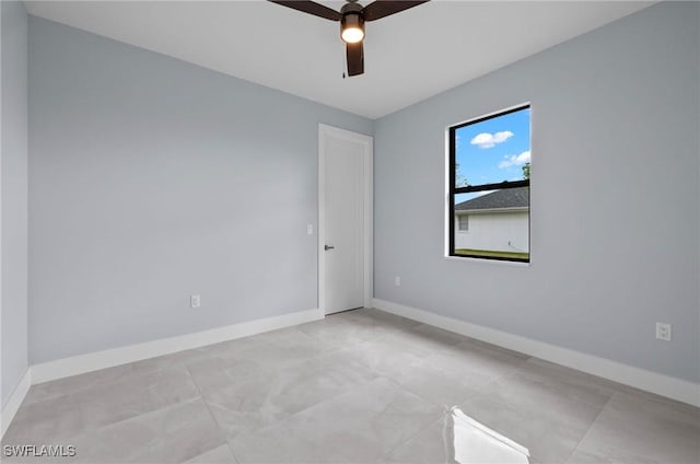 2218 SW 25th St, Cape Coral, FL 33914 - spare room with ceiling fan and baseboards