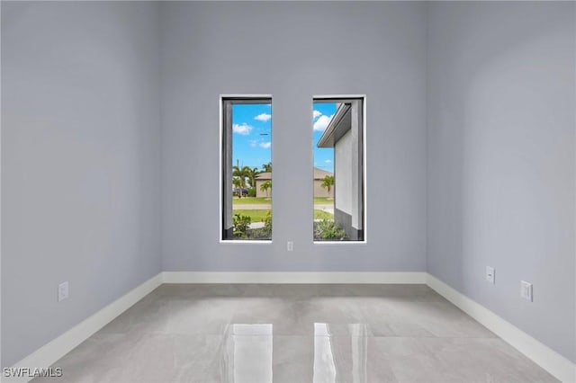 2218 SW 25th St, Cape Coral, FL 33914 - empty room with plenty of natural light