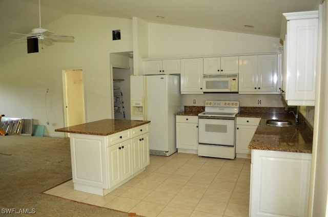 3808 27th St SW, Lehigh Acres, FL 33976 - kitchen with white appliances, high vaulted ceiling, ceiling fan, white cabinetry, and a kitchen island
