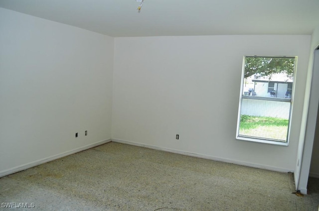 3808 27th St SW, Lehigh Acres, FL 33976 - spare room featuring baseboards