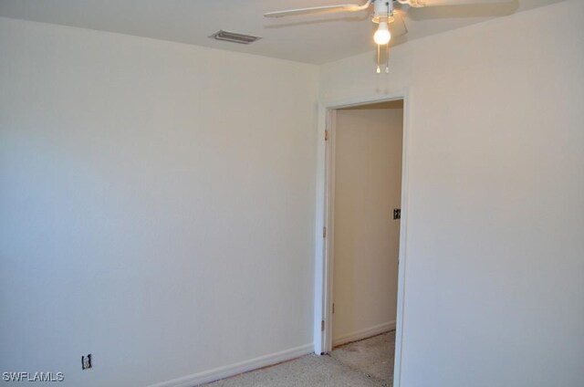 3808 27th St SW, Lehigh Acres, FL 33976 - empty room featuring a ceiling fan and light colored carpet