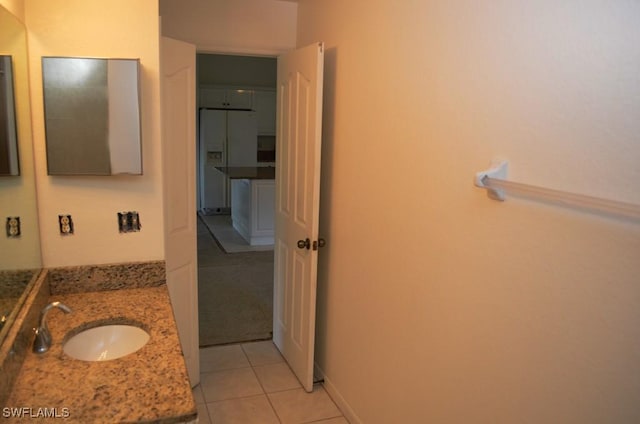 3808 27th St SW, Lehigh Acres, FL 33976 - bathroom featuring vanity and tile patterned flooring