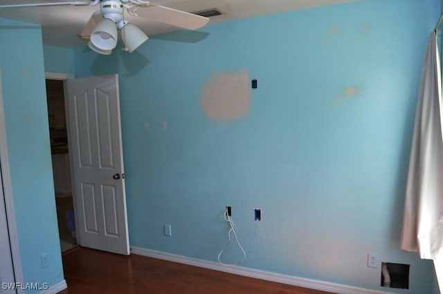 3808 27th St SW, Lehigh Acres, FL 33976 - unfurnished bedroom featuring wood finished floors and ceiling fan