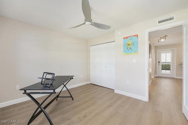 626 12th Ave S Unit 626, Naples, FL 34102 - unfurnished office featuring light wood-style flooring and a ceiling fan