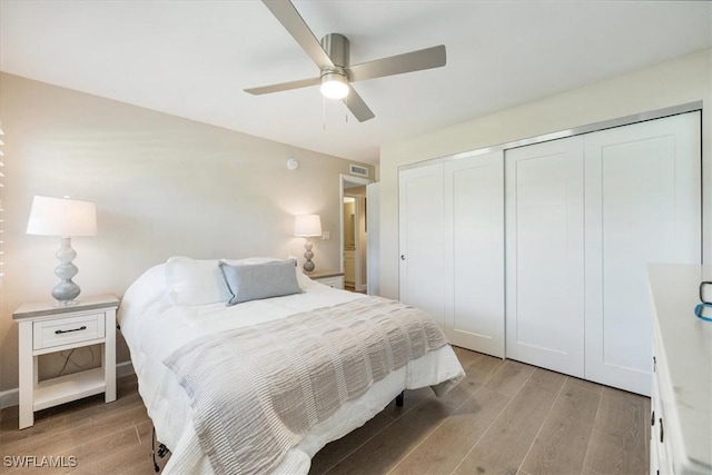 626 12th Ave S Unit 626, Naples, FL 34102 - bedroom with light wood-style floors, a closet, and ceiling fan