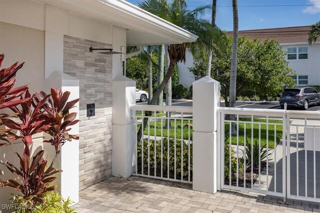 626 12th Ave S Unit 626, Naples, FL 34102 - gate featuring a ceiling fan