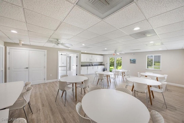 626 12th Ave S Unit 626, Naples, FL 34102 - dining area with a ceiling fan, light wood finished floors, a drop ceiling, and recessed lighting
