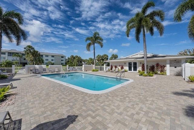 626 12th Ave S Unit 626, Naples, FL 34102 - community pool featuring a patio area