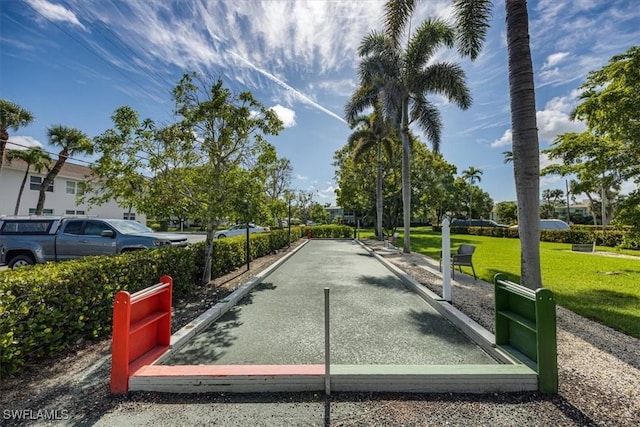 626 12th Ave S Unit 626, Naples, FL 34102 - view of home's community with a game area and a yard