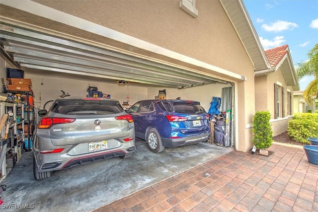 3200 Birch Tree Ln, Alva, FL 33920 - garage with concrete driveway and a garage door opener