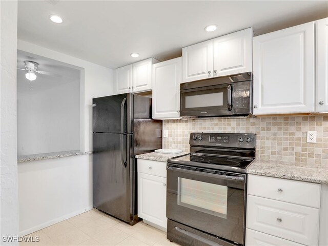 499 Forest Lakes Blvd Unit 207, Naples, FL 34105 - kitchen with black appliances, white cabinetry, backsplash, and recessed lighting