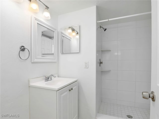 499 Forest Lakes Blvd Unit 207, Naples, FL 34105 - full bathroom with vanity and tiled shower