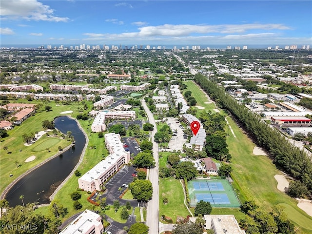 499 Forest Lakes Blvd Unit 207, Naples, FL 34105 - view of property location featuring city skyline, a local golf course, and a large body of water