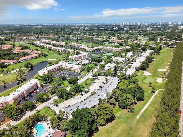 499 Forest Lakes Blvd Unit 207, Naples, FL 34105 - aerial view of property's location featuring city skyline and a large body of water