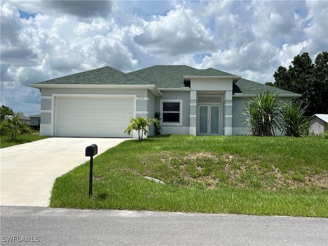 4208 28th St SW, Lehigh Acres, FL 33976 - prairie-style home with french doors, stucco siding, roof with shingles, concrete driveway, and an attached garage