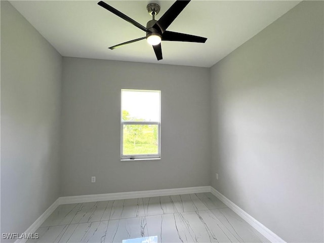 4208 28th St SW, Lehigh Acres, FL 33976 - spare room with light marble finish floors and ceiling fan