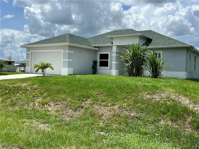4208 28th St SW, Lehigh Acres, FL 33976 - view of side of home with stucco siding, an attached garage, a yard, driveway, and a shingled roof