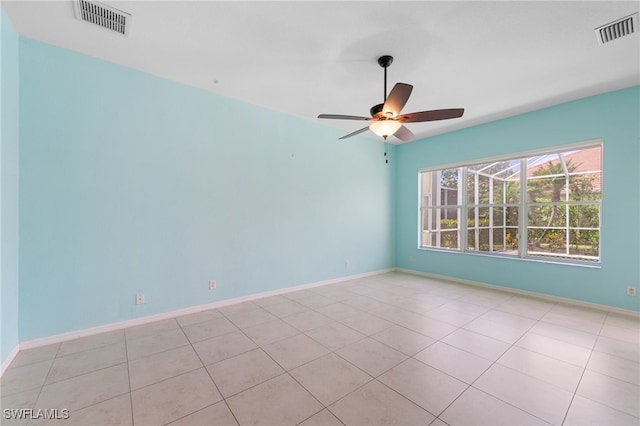 2628 Fairmont Cove Ct, Cape Coral, FL 33991 - unfurnished room with a ceiling fan and light tile patterned floors