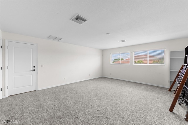 2628 Fairmont Cove Ct, Cape Coral, FL 33991 - carpeted spare room featuring baseboards