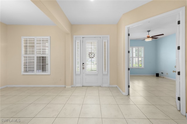 2628 Fairmont Cove Ct, Cape Coral, FL 33991 - foyer entrance with a ceiling fan and light tile patterned floors