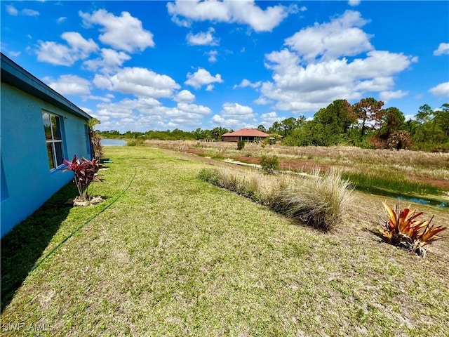 8000 Fountain Mist Blvd, Lehigh Acres, FL 33972 - view of grassy yard