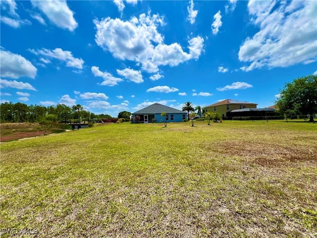 8000 Fountain Mist Blvd, Lehigh Acres, FL 33972 - view of green lawn