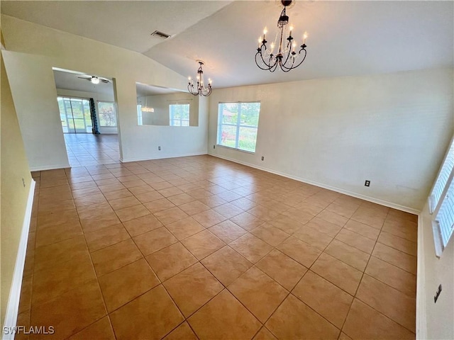 8000 Fountain Mist Blvd, Lehigh Acres, FL 33972 - unfurnished room featuring a chandelier, light tile patterned floors, vaulted ceiling, plenty of natural light, and ceiling fan
