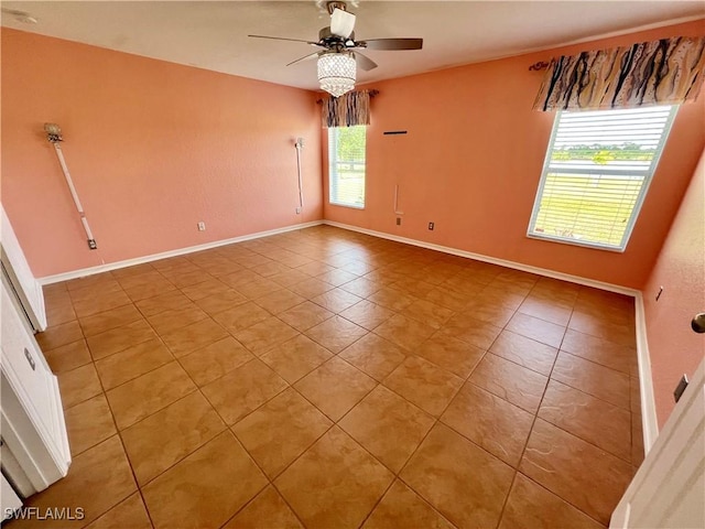 8000 Fountain Mist Blvd, Lehigh Acres, FL 33972 - unfurnished room with a ceiling fan and light tile patterned floors